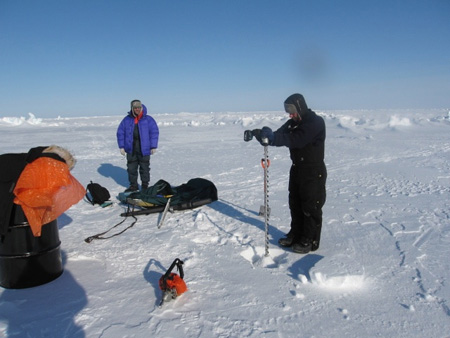 Drilling a hole in the ice