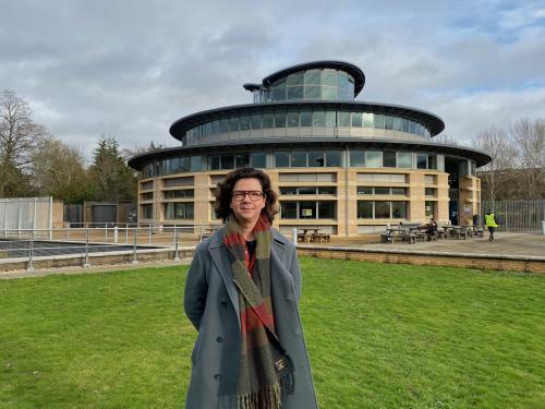 Vangelis Danopoulos standing in front of the Cambridge maths department